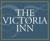 Logo of The Victoria Inn on a blue background.